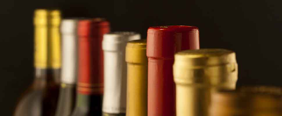 Que représentent les couleurs et les lettres sur les capsules des  bouteilles de vin ? - MJG Briu